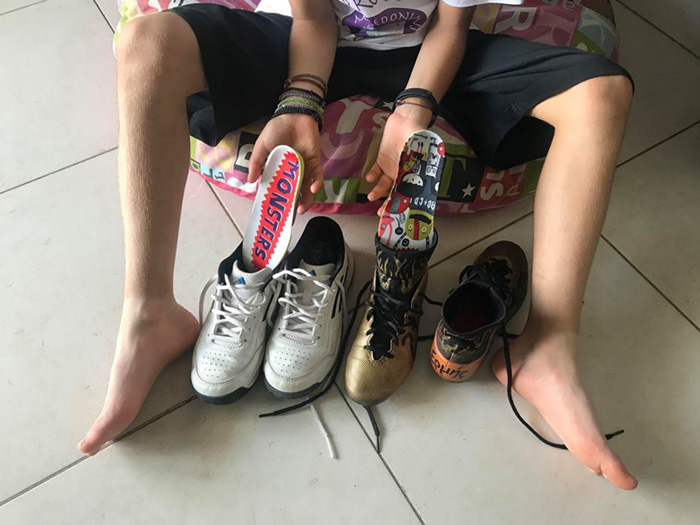 children's feet with anatomic insoles